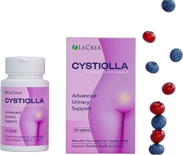 Cystiolla – biała buteleczka i różowe pudełko suplementu diety w tabletkach, obok rozsypane owoce jagodowe